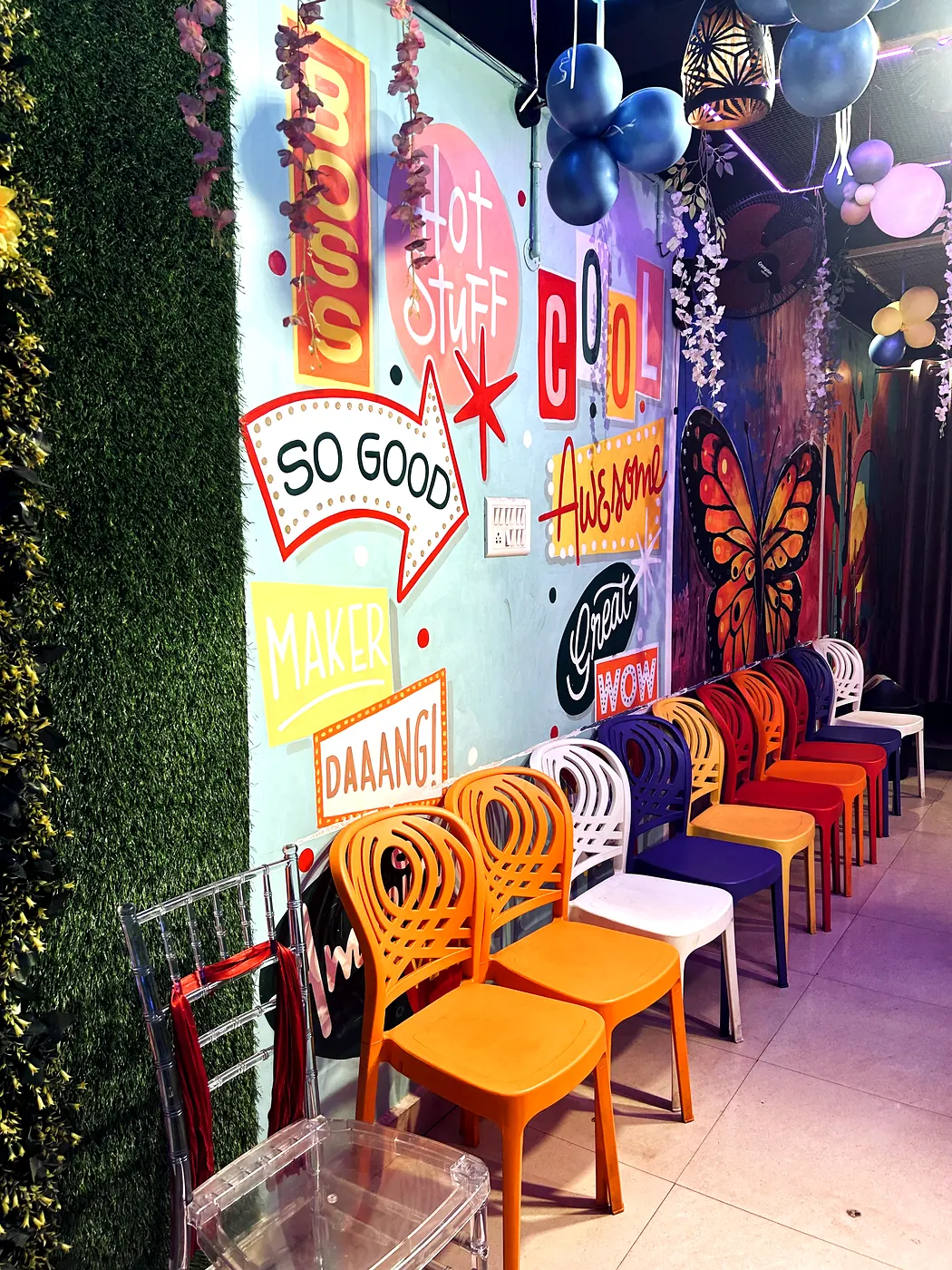 Butterfly and pop-art mural wall at JD Party Box