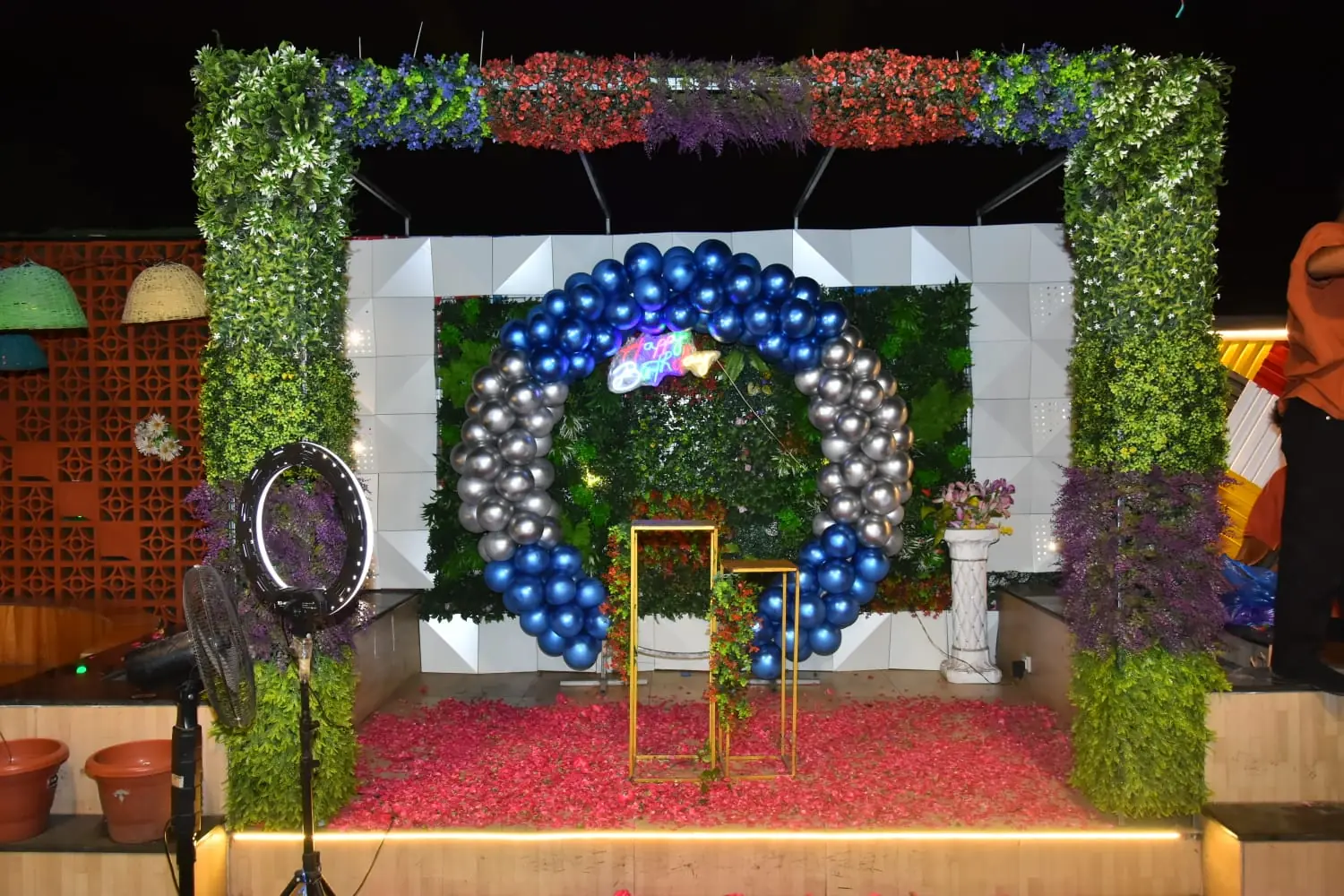 Blue and silver balloon arch birthday decor at JD Sky Dine