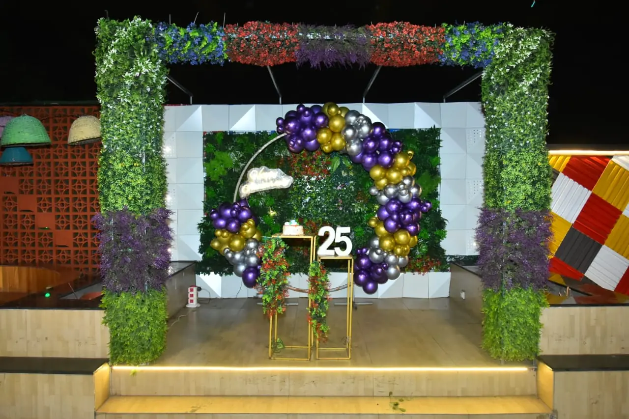 Purple gold and silver balloon arch for milestone birthday
